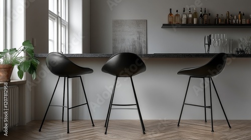 Modern interior featuring black bar stools at a stylish home bar with natural...