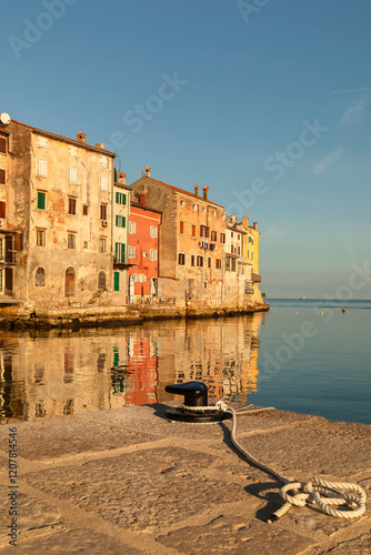 Old town of Rovinj mirroring in the water, Istria, Croatia photo