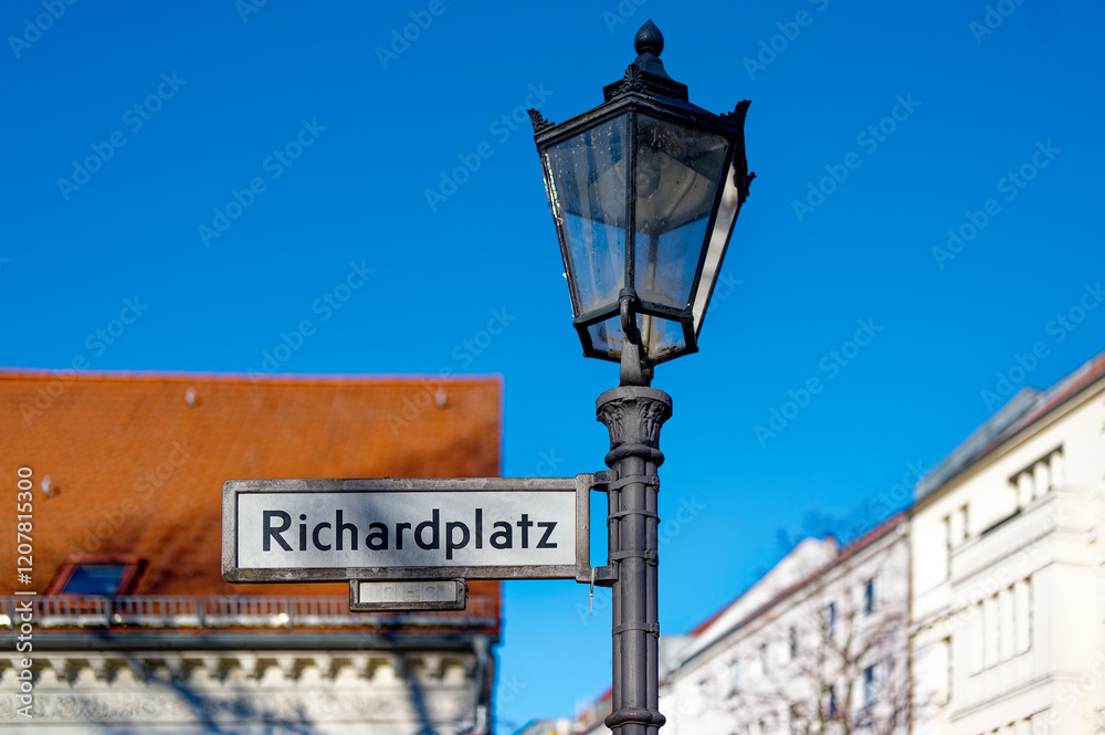 View of an old lantern in the historic district of Rixdorf in Berlin. View of an old lantern in the historic district of Rixdorf in Berlin.