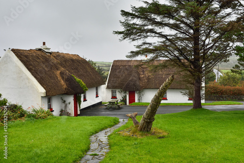 Thatched cottages at Tullycross, rainy wheather, Renvyle, Connemara, County Galway, Connacht, Republic of Ireland photo