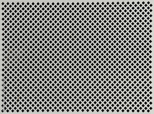 Industrial light grey black expanded metal in diamond shape with black background. Expanded metal with small diamond shapes.