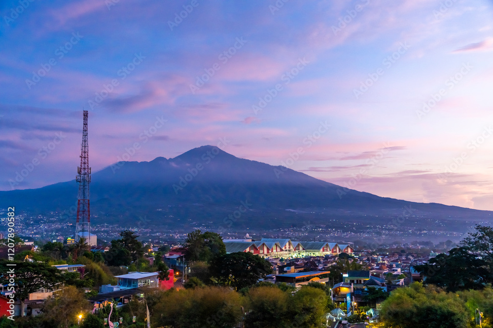 Fototapeta premium View towards Batu city , Malang, Indonesia from the top of the hill