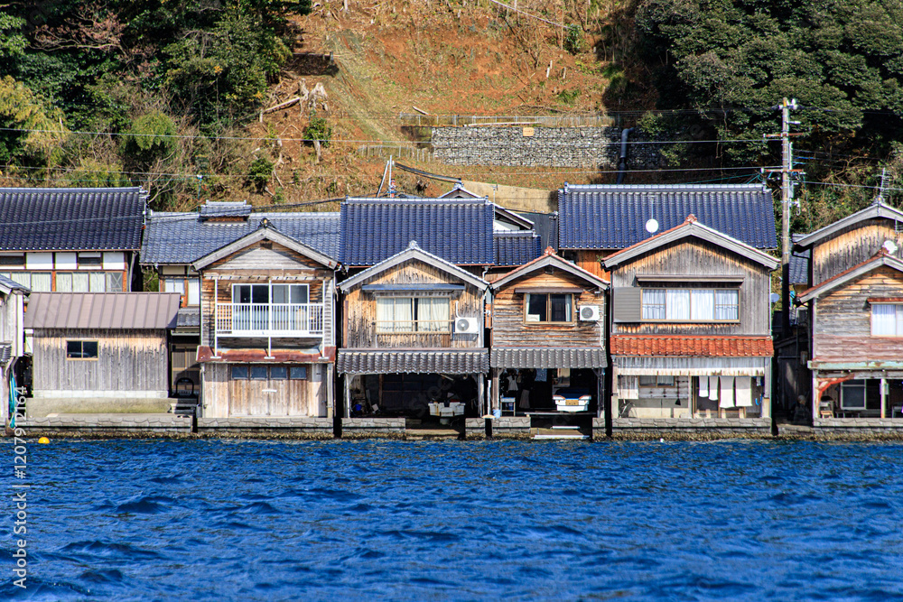 Charming Traditional Boat Houses Built Side by Side Along the Waterfront of Ine Bay, Kyoto, Japan Charming Traditional Boat Houses Built Side by Side Along the Waterfront of Ine Bay, Kyoto, Japan