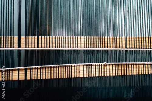 Foto Weaving shuttle on the warp