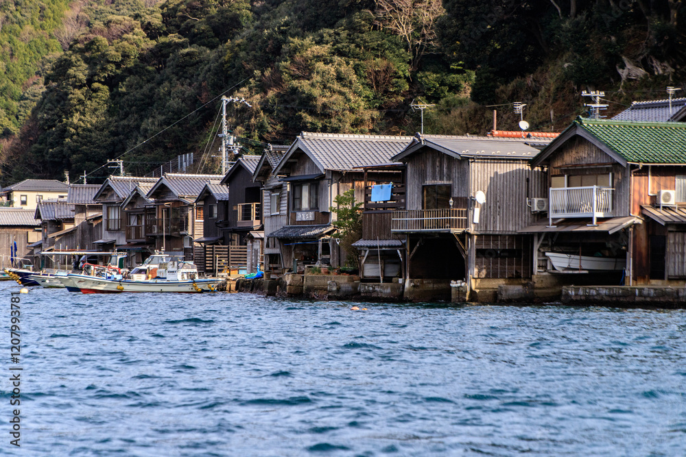 Naklejka premium Row of Traditional Boat Houses Along Ine Bay, Kyoto, Japan