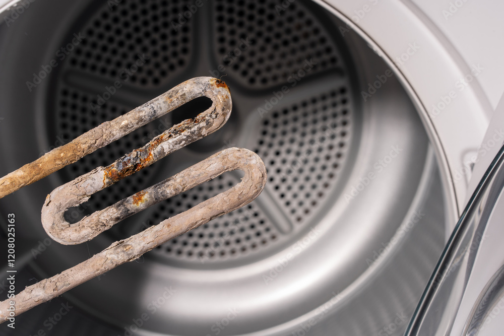 Close-Up of a Corroded Heating Element Inside a Dryer with Visible Limescale Deposits