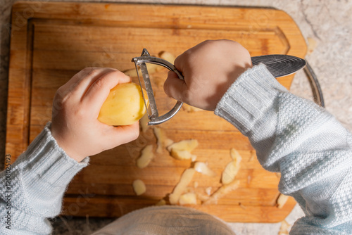 Child Peeling a Potato