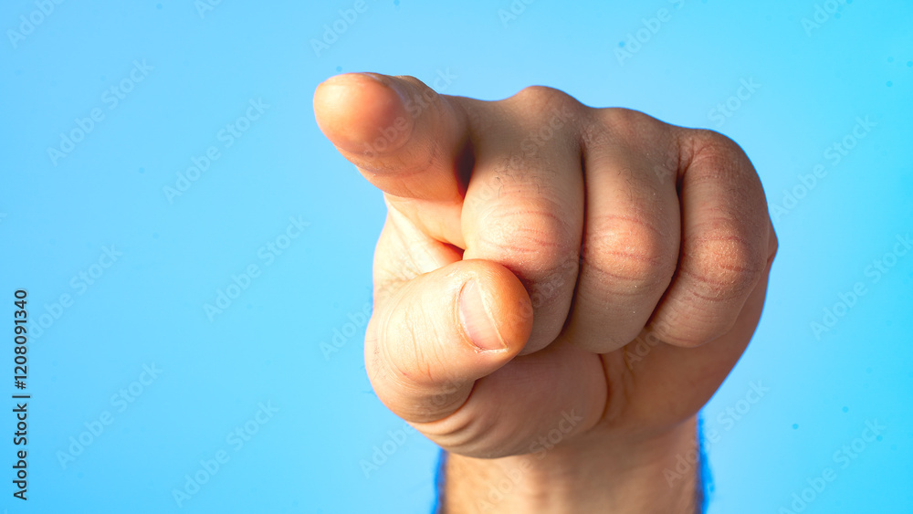 A hand pointing to the sky. The hand is raised and the fingers are spread out. Concept of excitement and enthusiasm