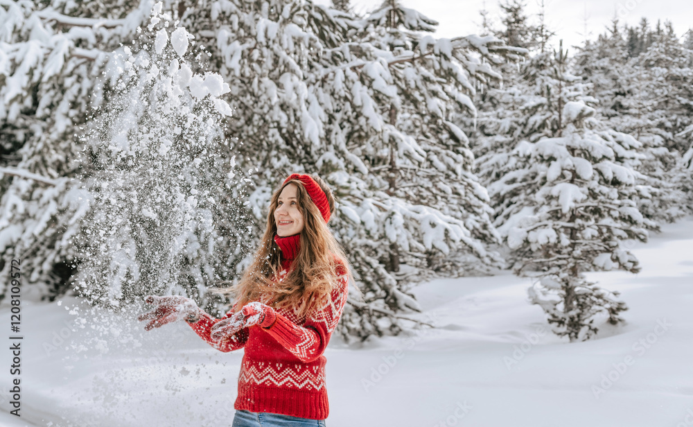 Women in Sweater Having Fun in Winter Forest