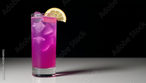 Vibrant purple cocktail garnished with lemon perfect for parties photo
