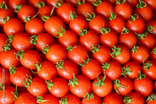 ripe juicy red tomatoes with leaves