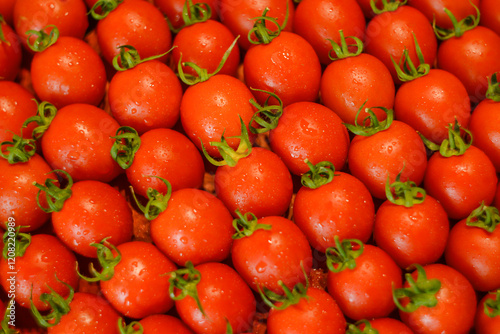 ripe juicy red tomatoes with leaves