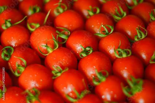 ripe juicy red tomatoes with leaves
