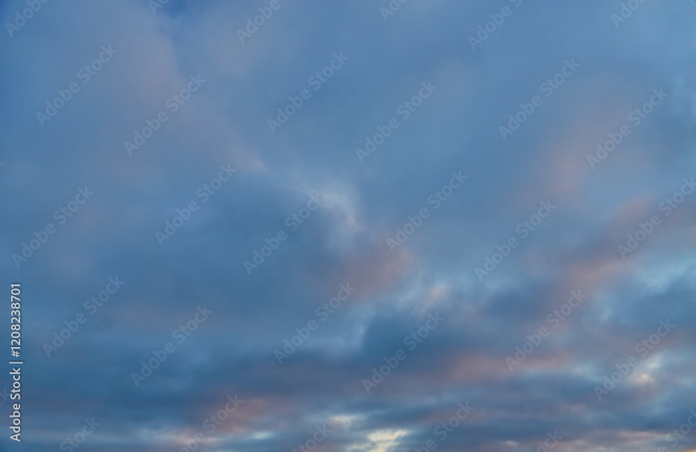 Sun rays break through the dense clouds in the sky. Sun rays break through the dense clouds in the sky.