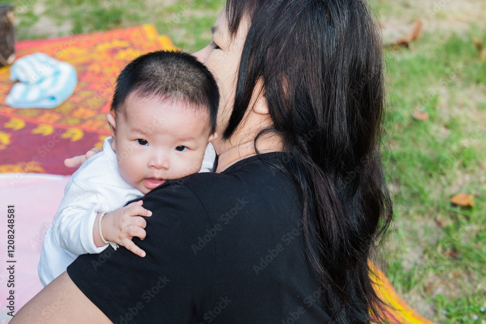 paternal grandmother and granddaughter on field paternal grandmother and granddaughter on field