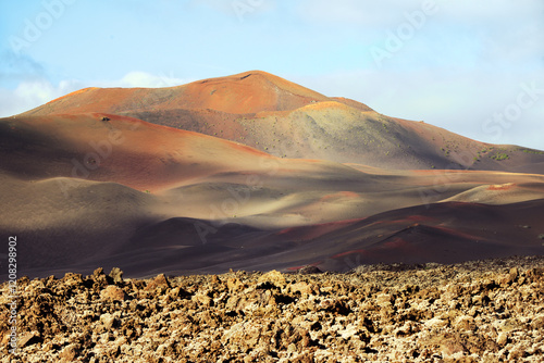 Obraz na płótnie Volcano cones and lava cinder fields of Timanfaya National Park, Lanzarote, Canary Islands. North from LZ-67 Lava Road near Uga w salonie