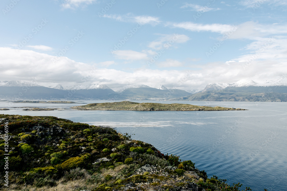 Landscape in the Beagle Channel on a sunny day with clear sky and clouds Landscape in the Beagle Channel on a sunny day with clear sky and clouds