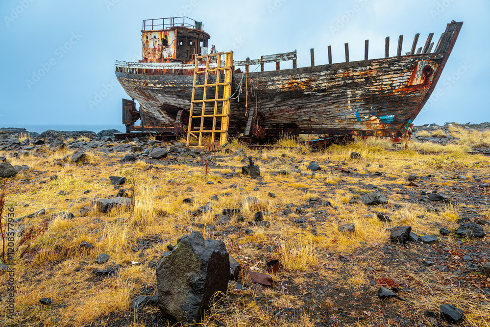 The wreck of an old fishing boat in the west of Iceland