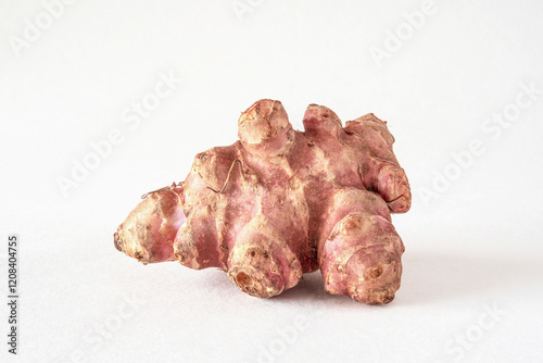 Close-up of isolated purple Jerusalem artichokes, topinambur photo