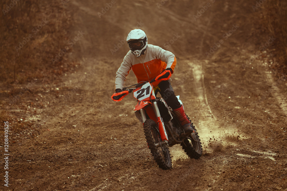 Motocross racer rides through the desert. Motocross racer rides through the desert.