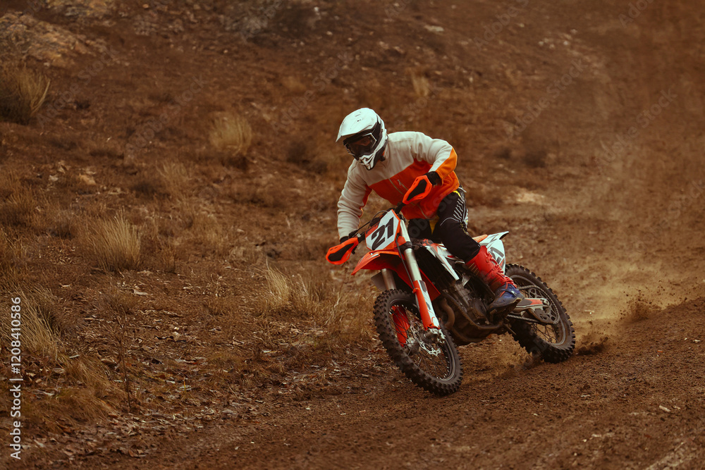 Motocross racer rides through the desert. Motocross racer rides through the desert.