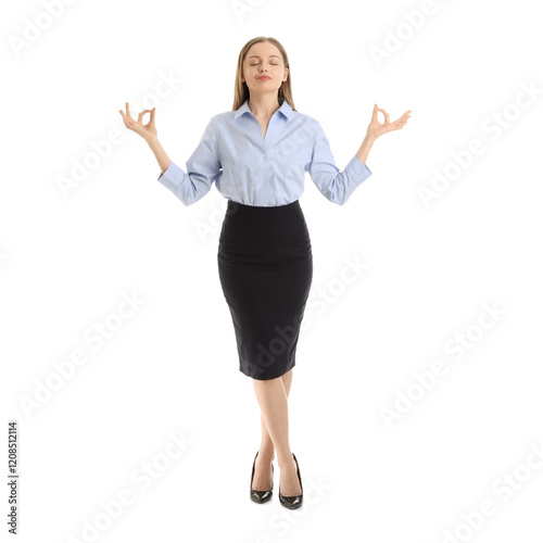 Young businesswoman meditat...