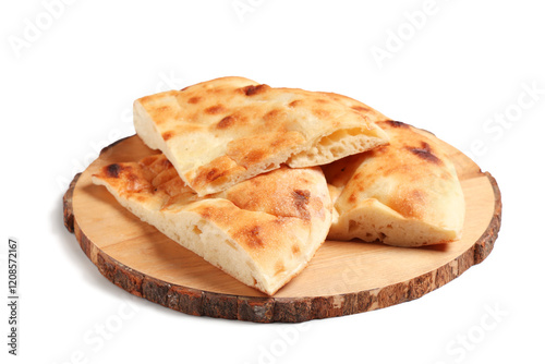 Wooden board with pieces of tasty lavash on white background photo