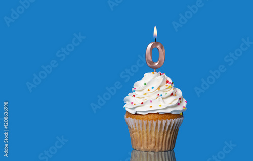 Birthday Or Anniversary Cupcake with Lit Candle; Number 0 Candle. photo