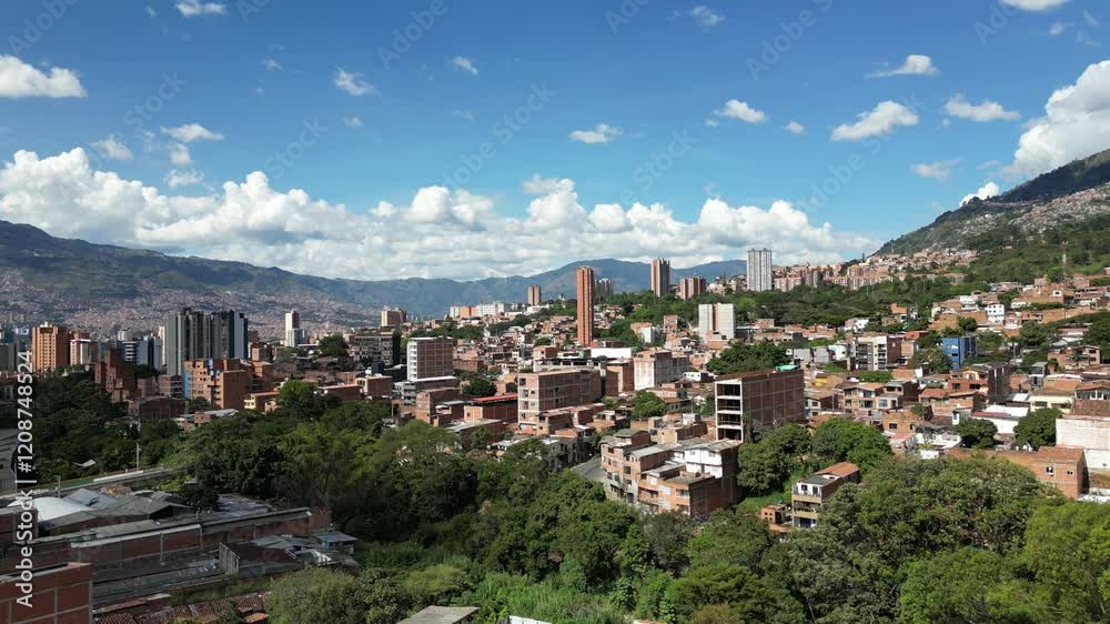 A breathtaking aerial drone view of Medellín, Colombia, showcasing its vibrant cityscape, lush greenery, and stunning mountainous backdrop. This dynamic footage highlights the urban and natural beauty A breathtaking aerial drone view of Medellín, Colombia, showcasing its vibrant cityscape, lush greenery, and stunning mountainous backdrop. This dynamic footage highlights the urban and natural beauty