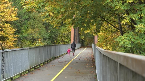 A mother with his child in Maplewood Roadside Park in Renton, Washington.  photo