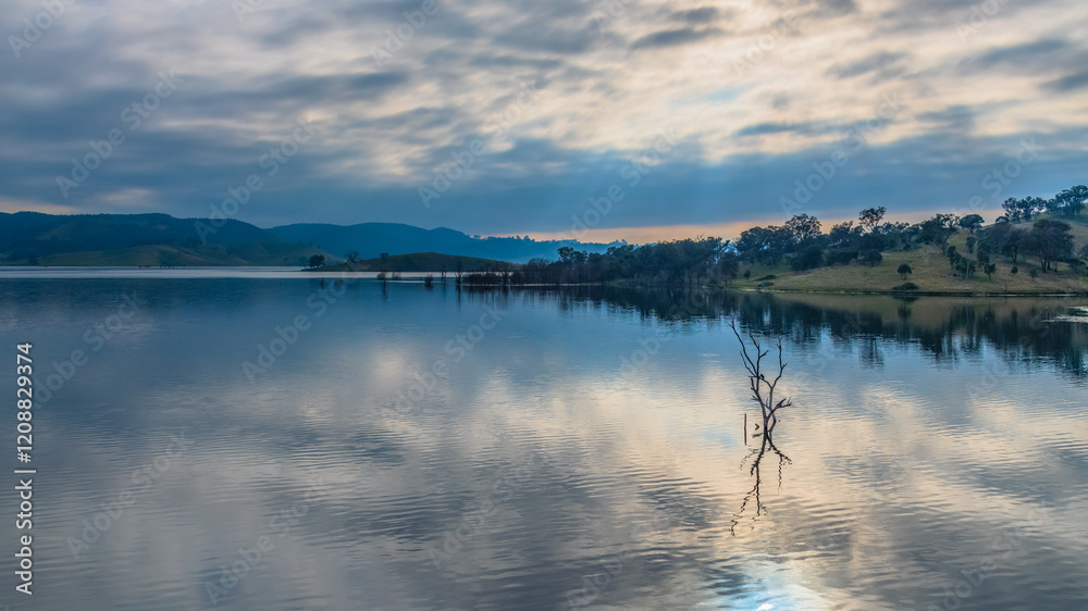 Fototapeta premium Morning cloud reflections at Windamere Dam in Cudgegong, close to Mudgee in the Central West of NSW, Australia.