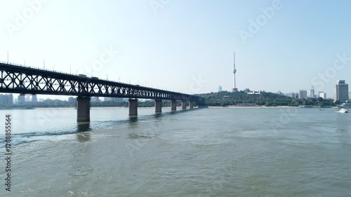 Wallpaper Mural An aerial view of the Wuhan Yangtze River Bridge spanning the Yangtze River, showcasing the bridge's elegant structure and the vast, flowing river beneath Torontodigital.ca