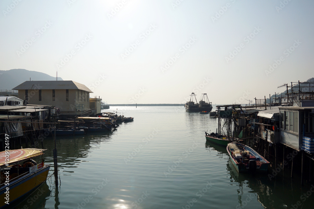 Fototapeta premium boats in the harbor at sunset, Tai O of Hong Kong