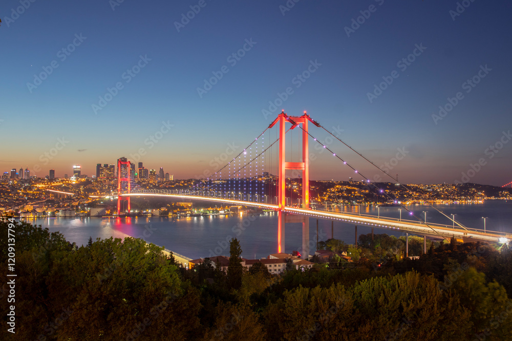 Istanbul Bosphorus Bridge at night. 15th July Martyrs Bridge (15 Temmuz Sehitler Koprusu). Istanbul, Turkey. Famous and best touristic destination Nation Park in Nakkastepe Romantic night landscape Istanbul Bosphorus Bridge at night. 15th July Martyrs Bridge (15 Temmuz Sehitler Koprusu). Istanbul, Turkey. Famous and best touristic destination Nation Park in Nakkastepe Romantic night landscape