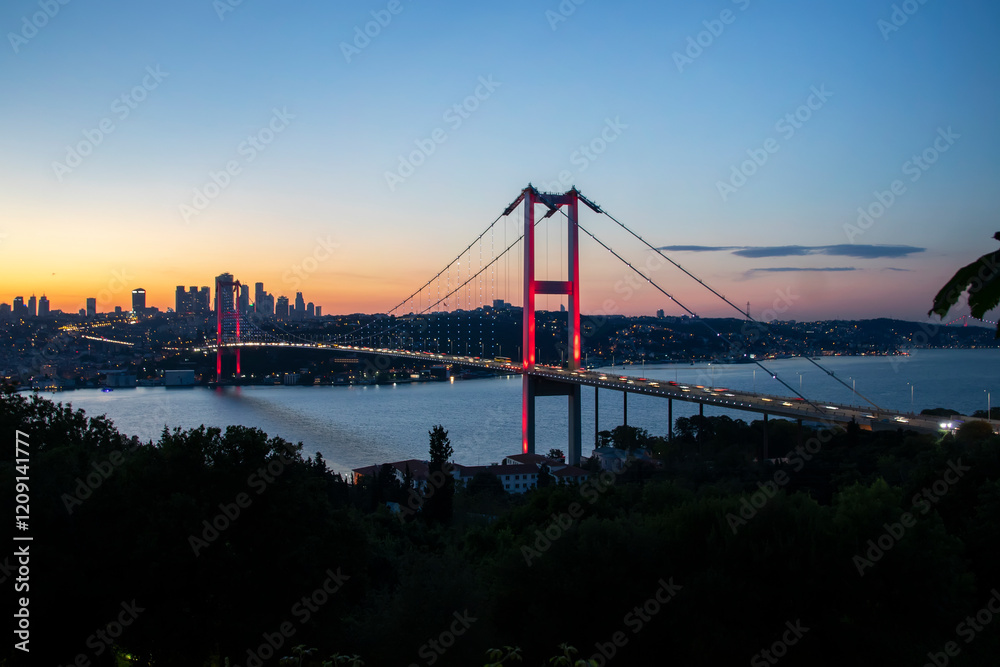 Fototapeta premium Istanbul Bosphorus Bridge at night. 15th July Martyrs Bridge (15 Temmuz Sehitler Koprusu) Istanbul Turkey Most famous and best touristic destination Nation Park in Nakkastepe Romantic night landscape