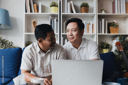 LGBTQ couple shares joyful moment while planning their family adoption in a cozy home setting