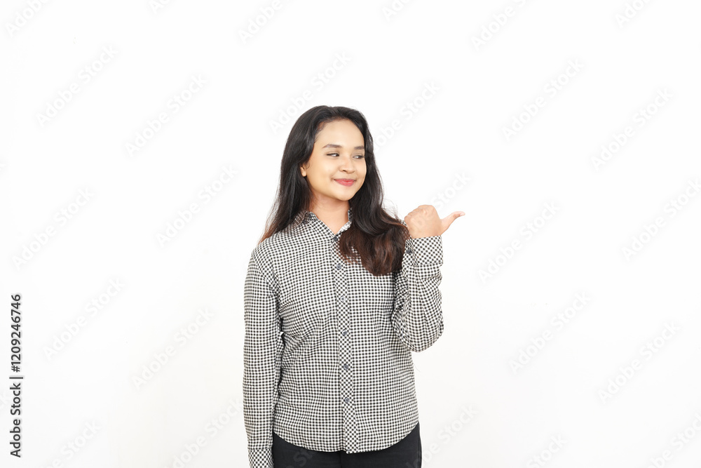 Pointing to the Side using thumb Of Beautiful Asian Woman Isolated On White Background Pointing to the Side using thumb Of Beautiful Asian Woman Isolated On White Background