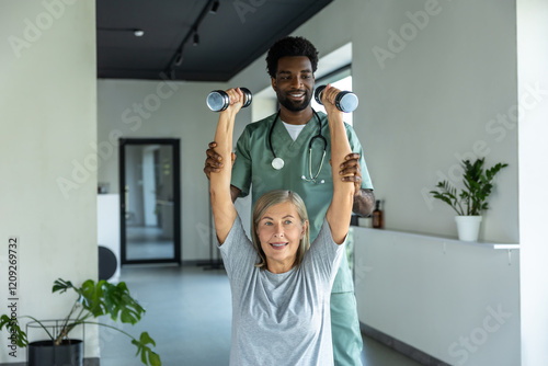 Doctor helping woman with pain relief through physiotherapy and rehabilitation in hospital