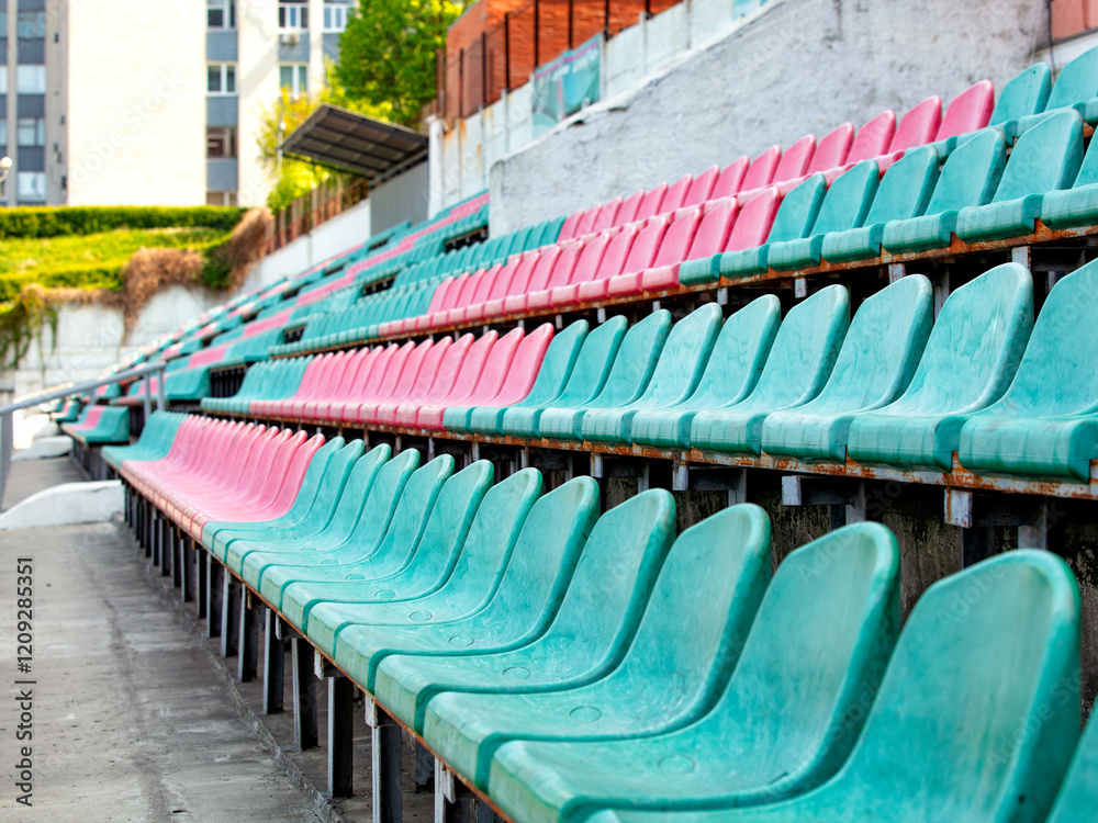 Vibrant seating arrangement in a modern sports venue on a sunny day
