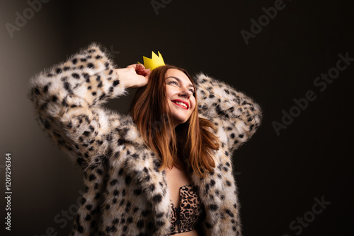Bilde på lerret A stylish and confident woman joyfully celebrates life, wearing a fur coat and c
