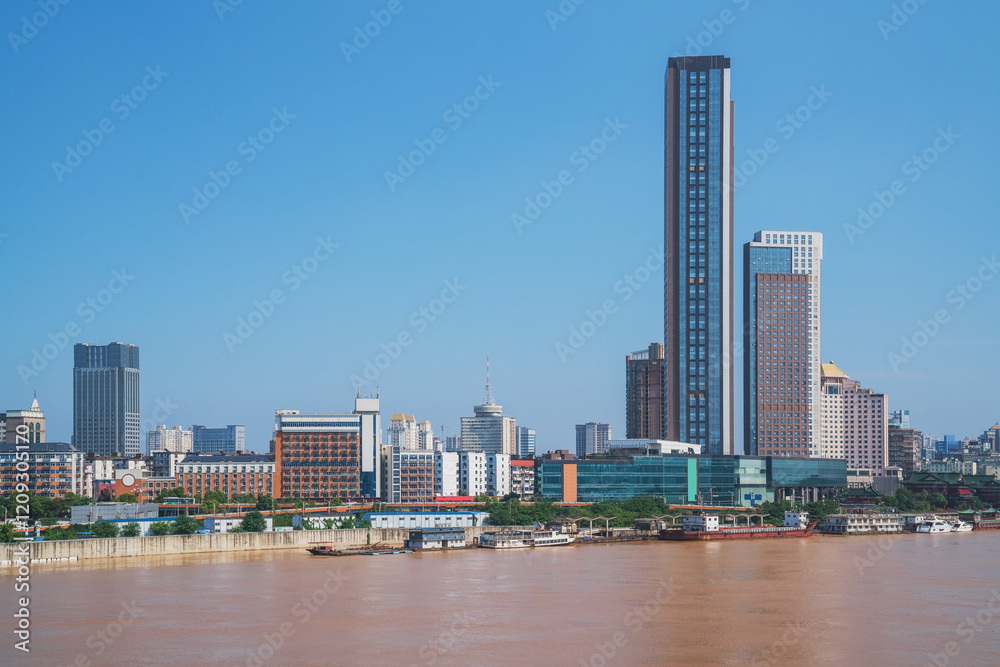 Fototapeta premium The urban skyline and Ganjiang River scenery of Nanchang City, Jiangxi Province, China on April 1, 2024