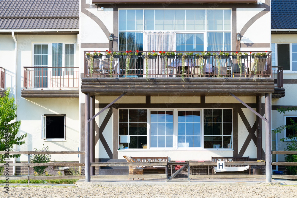 Fototapeta premium white building ranch south Western architecture style motel place apartments facade exterior entrance symmetry balcony walls and windows