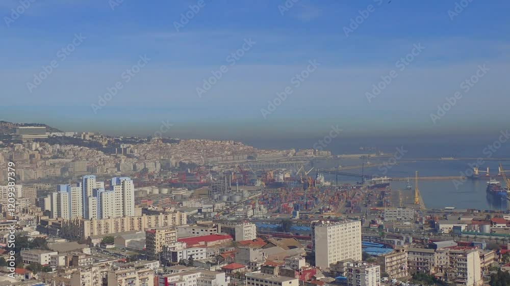 Capital of Algeria, Algiers is the capital and largest city of Algeria, situated on Mediterranean coast of Northern Africa, City view of Algiers and its old white buildings, Port of Algiers. Capital of Algeria, Algiers is the capital and largest city of Algeria, situated on Mediterranean coast of Northern Africa, City view of Algiers and its old white buildings, Port of Algiers.