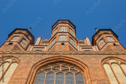 Obraz na płótnie Facade of the historic St. Mary church in Torun, Poland w salonie