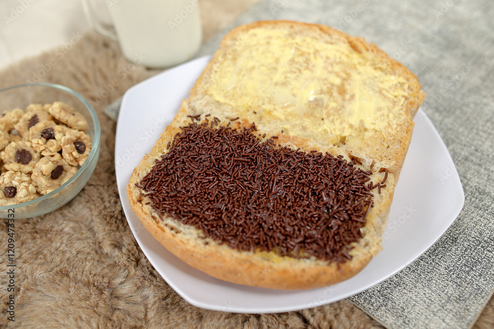 Bread with chocolate choco rice and butter with milk and snack for breakfast
Bread with chocolate choco rice and butter with milk and snack for breakfast