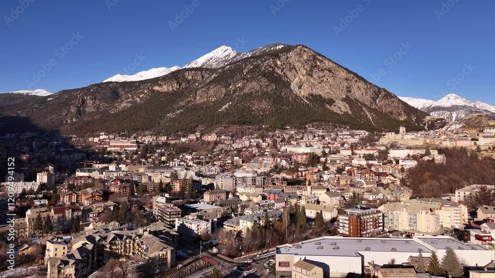 Aerial panorama of mountain town under clear blue sky in winter Aerial panorama of mountain town under clear blue sky in winter