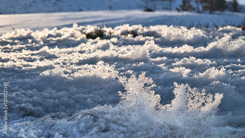 Ice crystals in a snow-covered landscape in the high mountains of Norway. photo