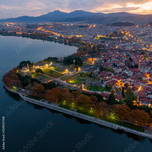 Aerial view of Ioannina by night on Ioannina Lake, Epirus region, Greece.  photo