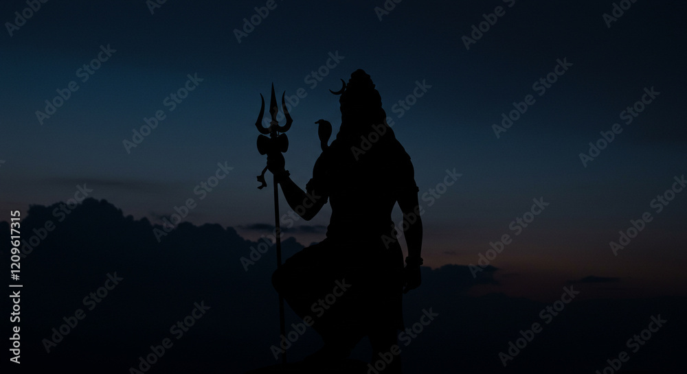Fototapeta premium Lord Shiva Holding Trident in Twilight Silhouette