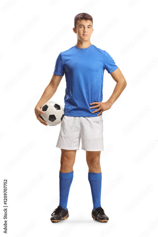 Young football player posing with a ball Young football player posing with a ball